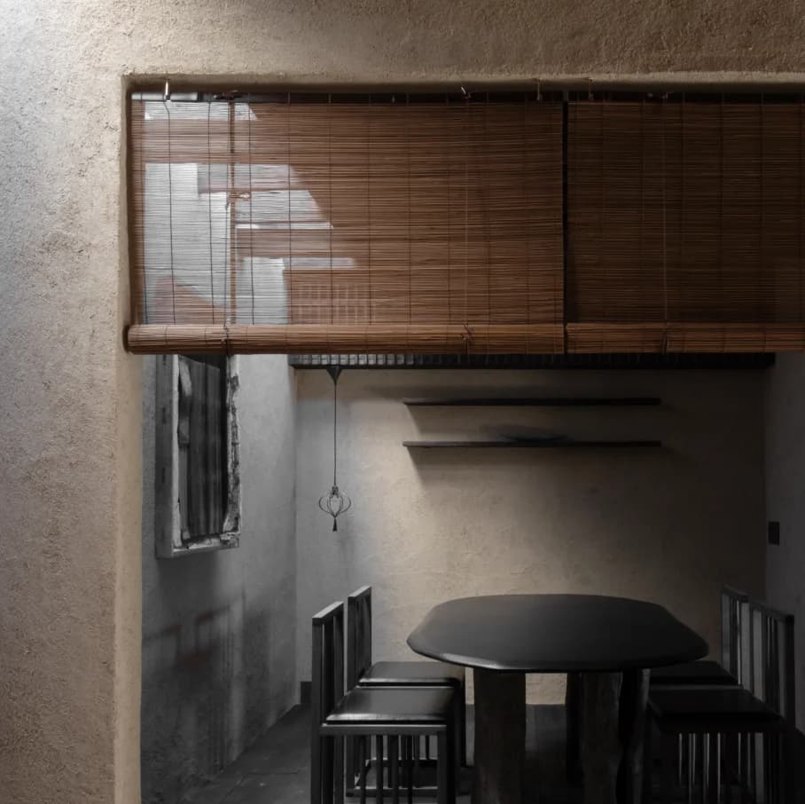 Tea preparation tools arranged on wooden surface