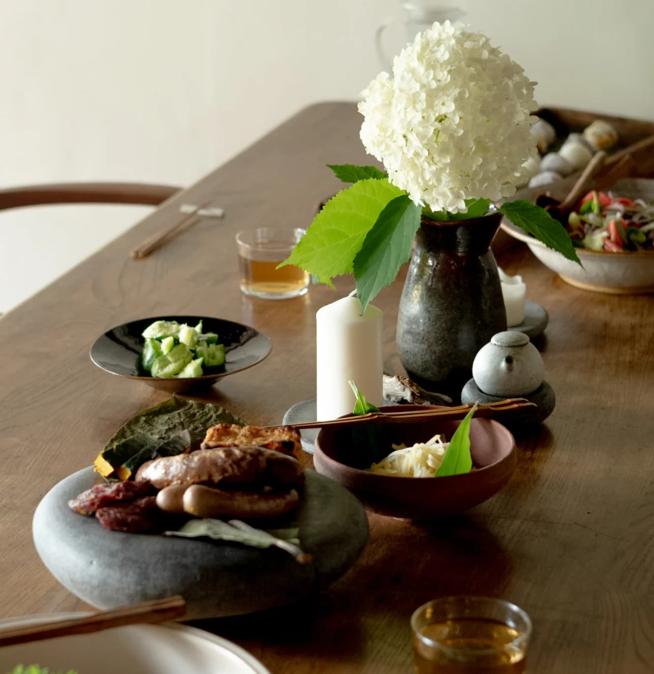 Close-up of glazed ceramic vessel with traditional patterns