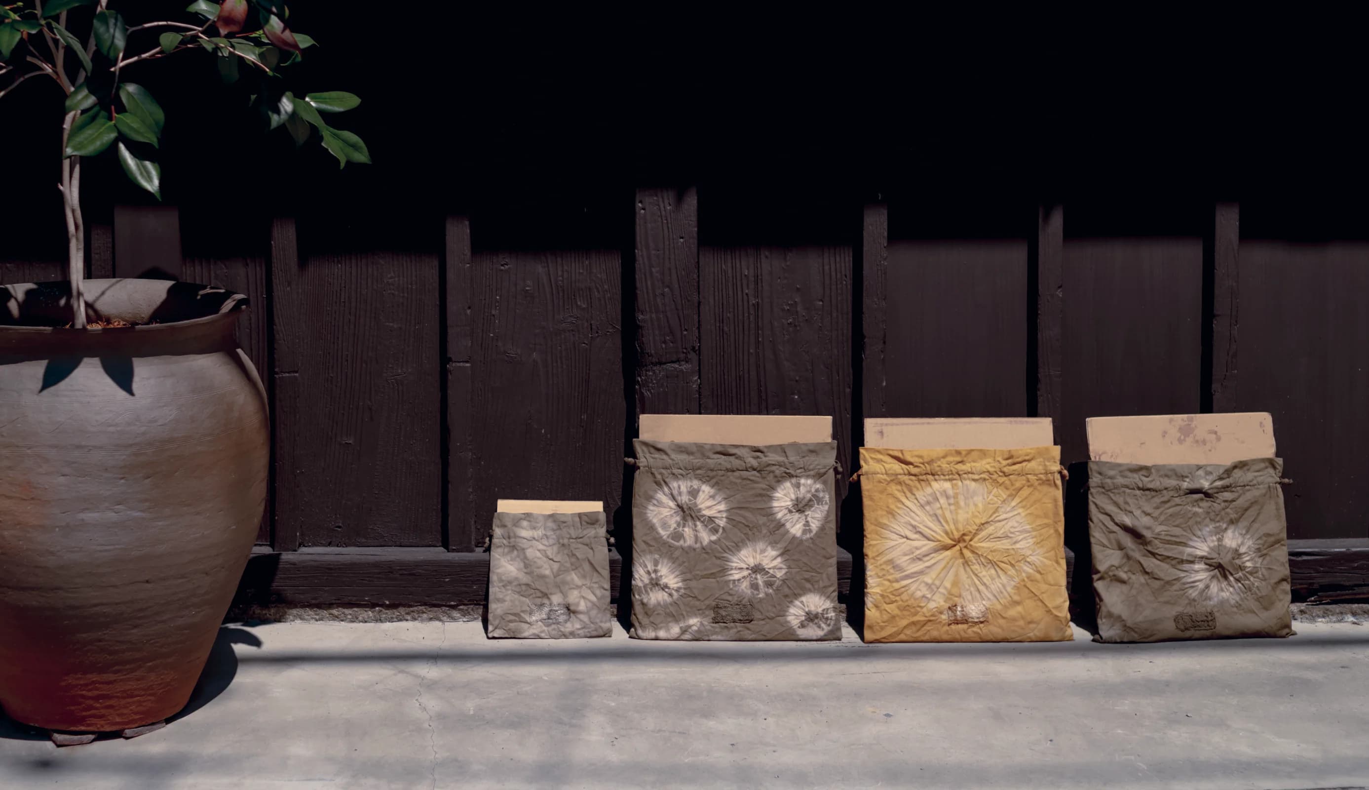 Tea-dyed items drying in the sun