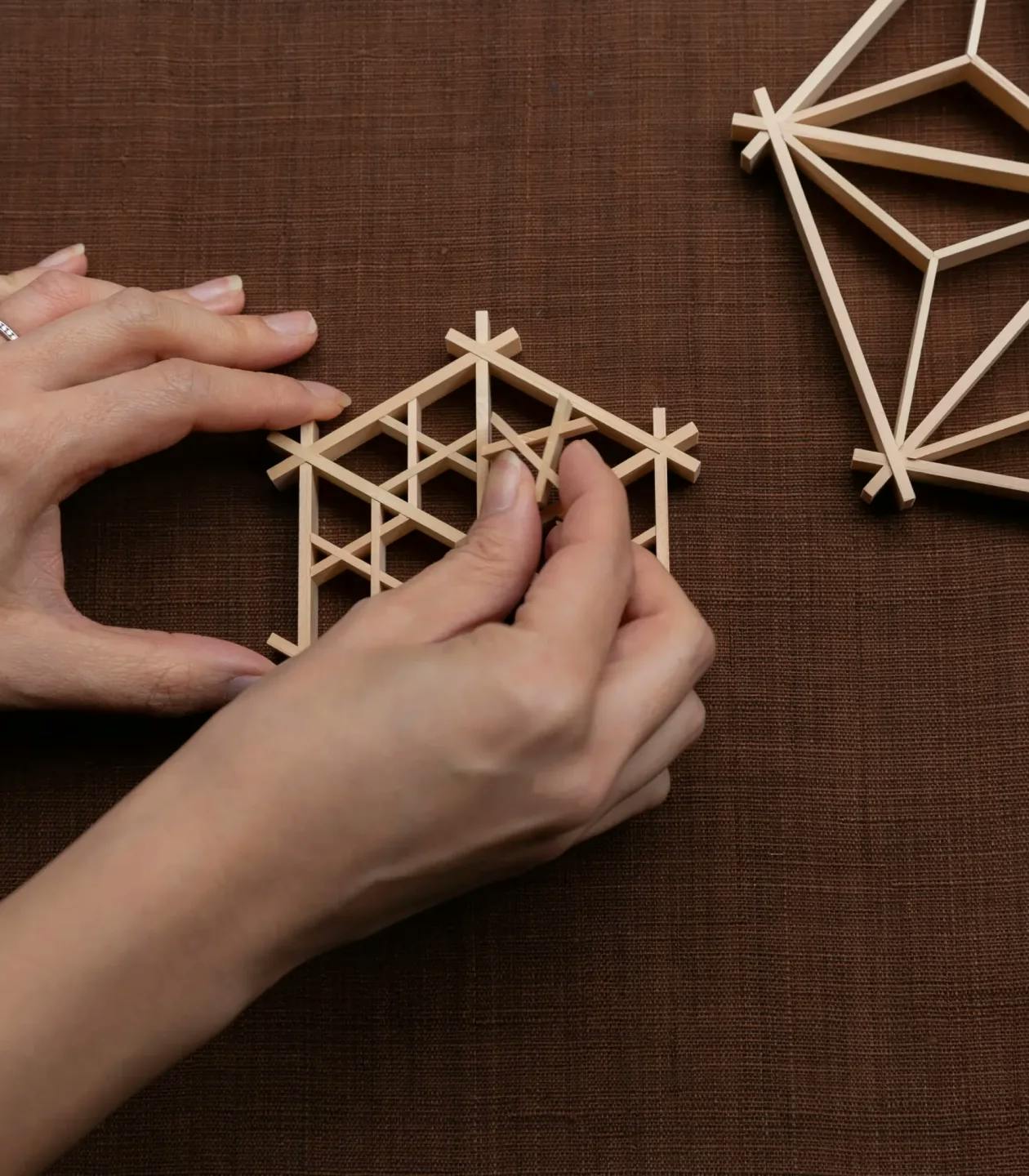 Image of person making Kumiko wooden latticework